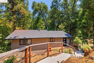 Rustic home featuring a shingled roof