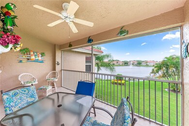 Balcony featuring a ceiling fan, a water view, and outdoor dining space