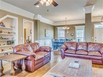 Grand Living room - hard wood flooring and built i