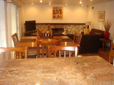 View from kitchen to additional eating area and Fa