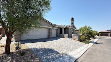 Ranch-style home with an attached garage, decorati