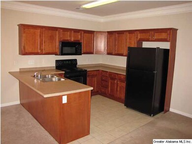 Great kitchen with breakfast bar.