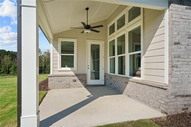 View of patio with ceiling fan