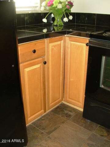 Black Appliances and Granite Counter