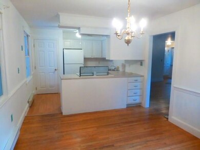 KITCHEN IS OPEN TO DINING ROOM.