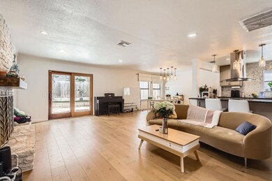 Living room featuring recessed lighting, light wo