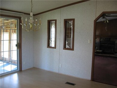 Dining Room. The sliding doors lead to the back po