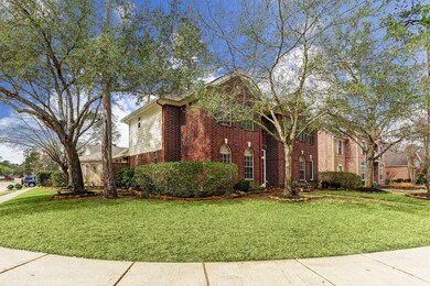 This home boasts a beautiful corner lot with garage neatly tucked away on the side, as not to distract from the stately front elevation.