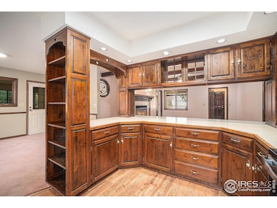 Kitchen with breakfast bar opens up to the family room
