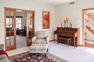 Beautiful sliding french doors between the formal 