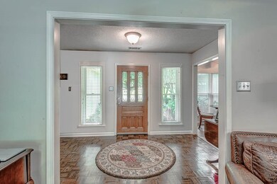 Enter into a spacious Foyer with Parquet flooring,