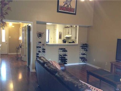 Open Great Room with Wood Floors, High Ceilings an