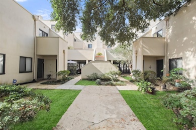 Landscaped and well-kept grounds. Parking garage i