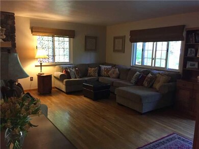 Living Room. Hardwood floors, neutral tones and a 