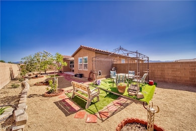 Fenced backyard featuring a patio