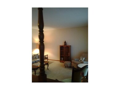 Spacious living room off entry, nice carpet.