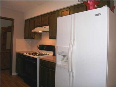The west wall of the kitchen. Note the easy care w