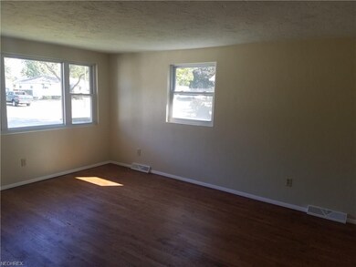 Spacious living room with plenty of natural light,