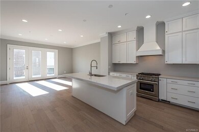 Stunning kitchen with stacked cabinets to top of 1