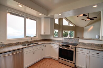 Open and inviting, this beautifully remodeled kitc