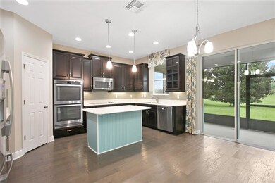 Tons of natural sunlight blankets the kitchen.