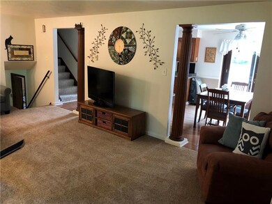 Living room view shows access to upper and lower l