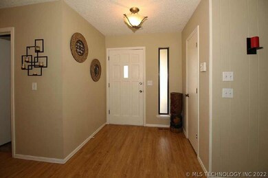 Entry way. Updates are found thru out.Laminate flo