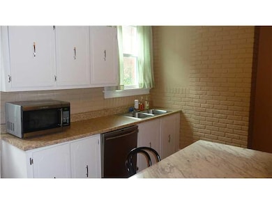 Kitchen. Oppostie veiw of kitchen showing addition