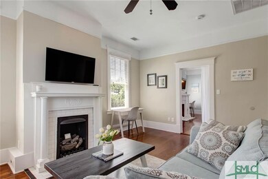 Classic Savannah fireplace w/tile; desk space