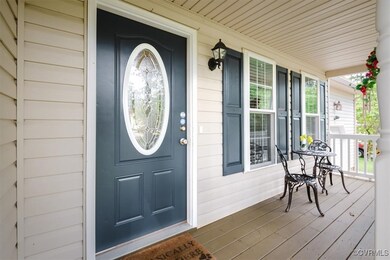 Property entrance with a porch