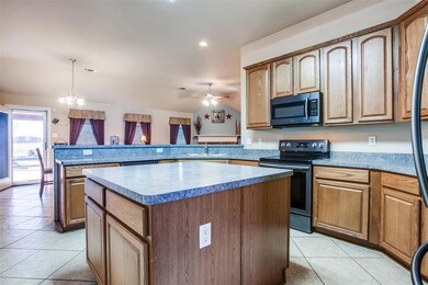Oversized island looking into dinning area.