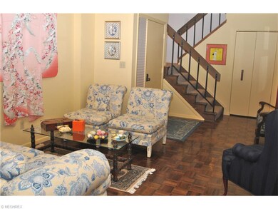 Beautiful parquet flooring highlights the entry an