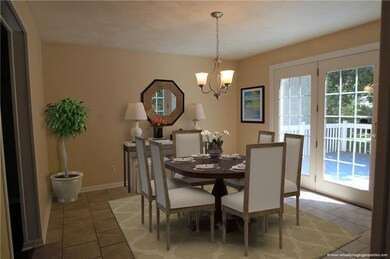 The dining room features french door access to the