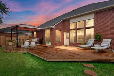 Enjoy the Texas sunsets on the extended back deck. The tented pergola stays with the home. No back neighbors and a gate that opens to a community walking path.