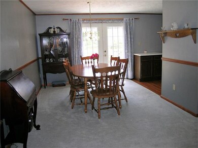 Large Dining Room area with updated French Doors l