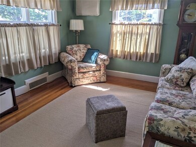 Large living room with shining hardwoods