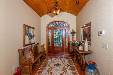 Inviting Foyer continues with pine Tongue & Groove