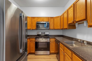 Spicket Commons unit 206, Methuen, MA 01844 - photo 3