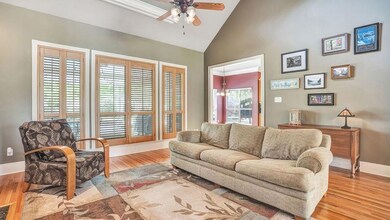 Living Room Overlooks Pool and Outdoor Living Area