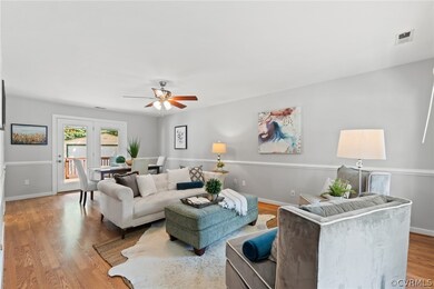 Family room with wood laminate flooring