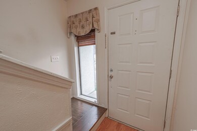 Entrance foyer with a healthy amount of sunlight a