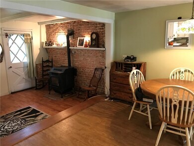 Working pellet stove throws great heat to the whol