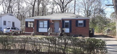 All brick, paved driveway