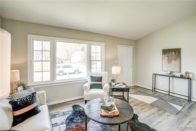 Living room featuring light hardwood / wood-style
