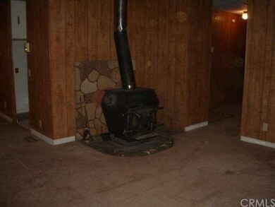 Woodstove in living room.
