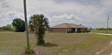 Ranch-style home with a front yard