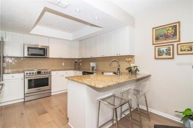 Beautiful, upgraded kitchen with breakfast bar