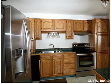 Kitchen Notice the new stainless steel appliances!