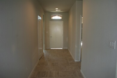 Expansive gallery style entry in soft grey tones showcases your art collection or treasured family portraits beautifully!