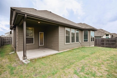 Back of property featuring a fenced backyard, a p